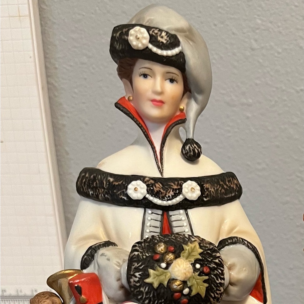 Avon Collectible Figurine with Red Accents
